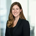 Woman in a professional setting with a blurred background